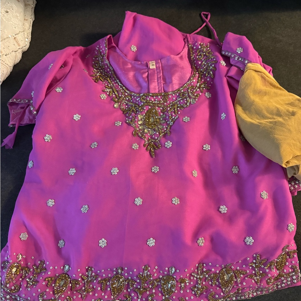 Brand new Lehengha size 46 (extra large) comes with skirt and matching scarf.